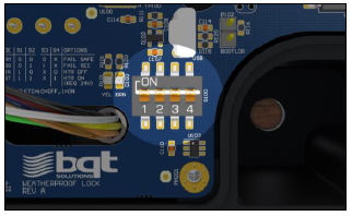 Close-up of YG80 circuit board showing dip switches.