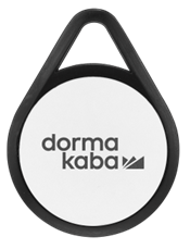 Picture of a plastic fob, white with black frame, and dorma kaba printed on it.